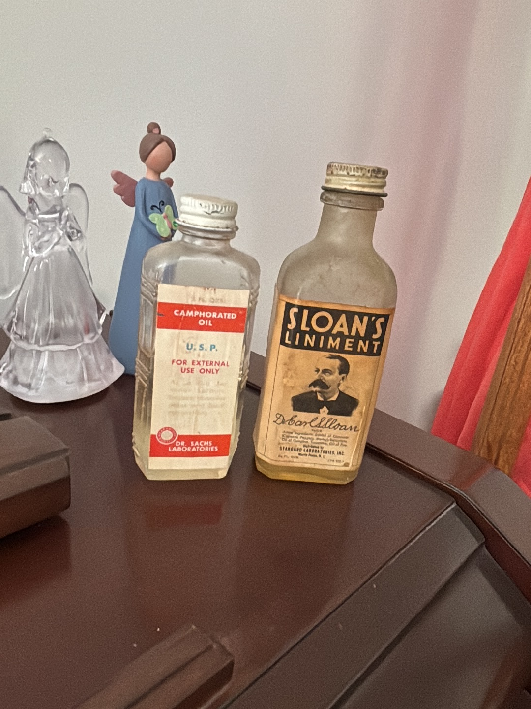 Vintage medicinal bottles: Sloan's Liniment and Camphorated Oil by Dr. Sachs Laboratories