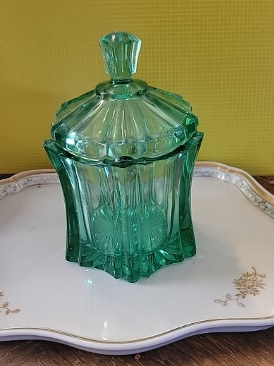 Pressed glass candy dish with lid in 'Vulcan' pattern by Fenton Glass Company
