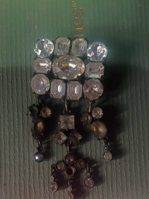 Vintage rhinestone brooch with clear crystals in silver-tone setting