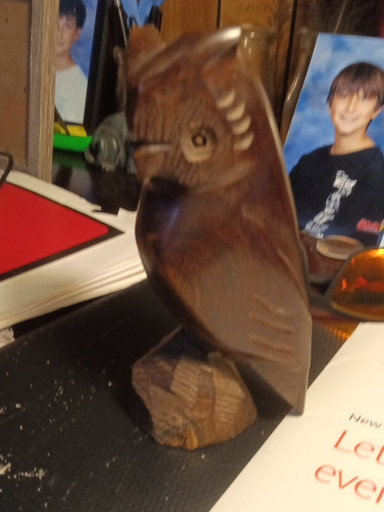Hand-carved wooden owl sculpture