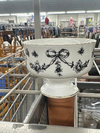 Bone china footed dessert bowl with black floral and bow decoration by Royal Victoria