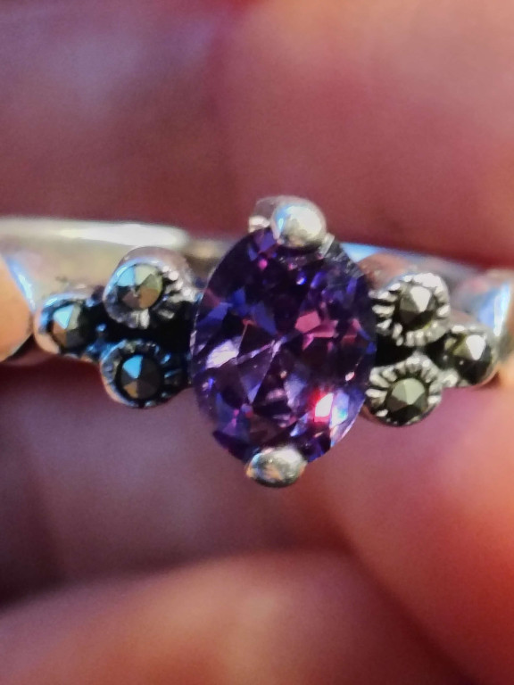 Sterling silver ring with amethyst gemstone and marcasite accents