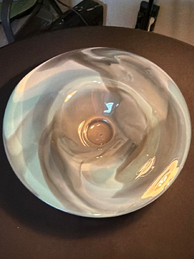 Opalescent glass bowl with blue and white swirl pattern, likely Kosta Boda 'Atoll' series
