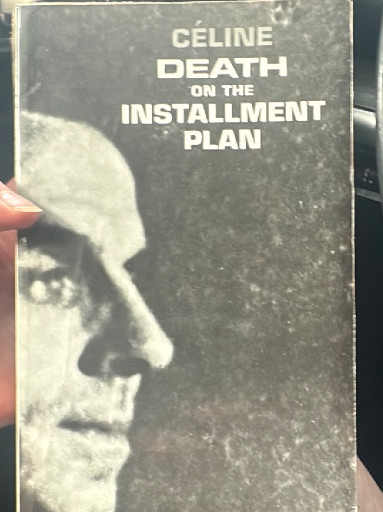 Paperback book titled 'Death on the Installment Plan' by Louis-Ferdinand Céline