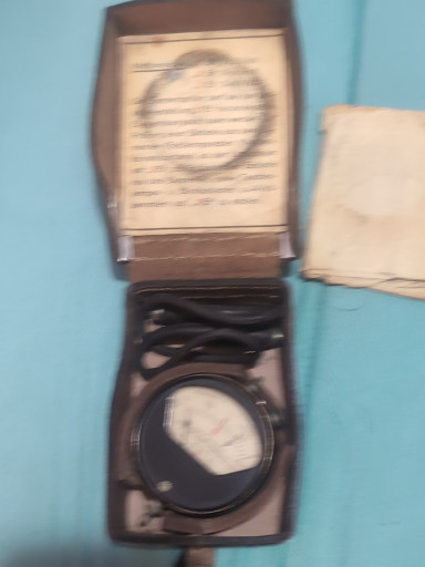 Vintage exposure meter in leather case, likely Dejur Autocritic Model 50A