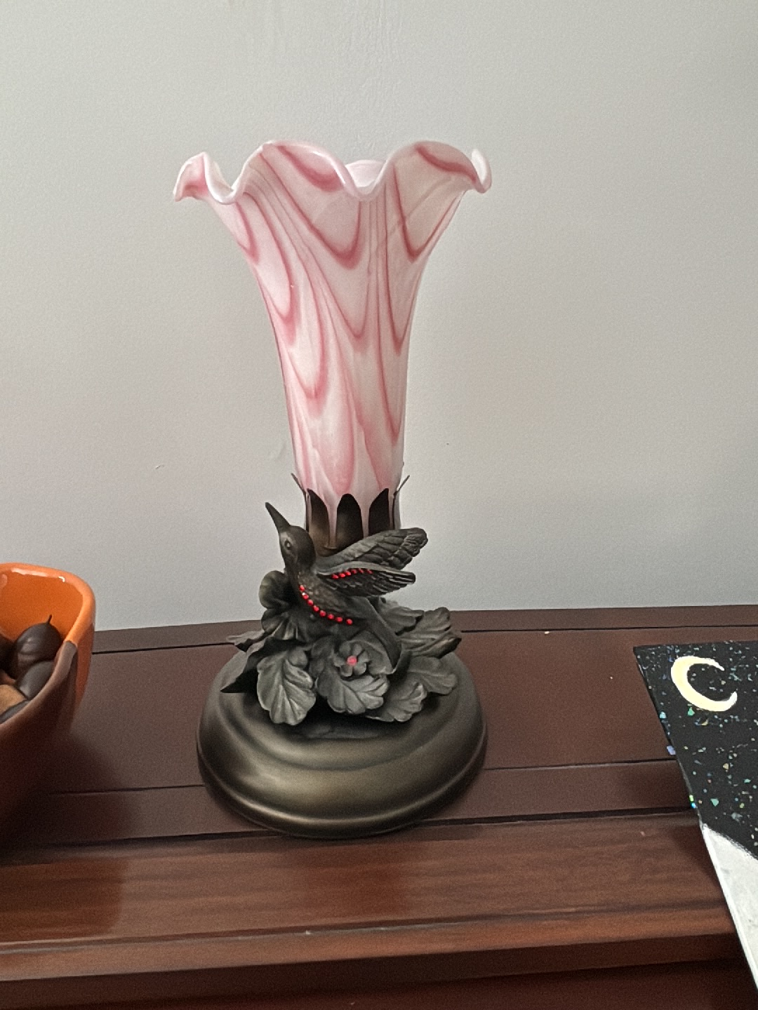 Glass and metal accent lamp with hummingbird design by Dale Tiffany