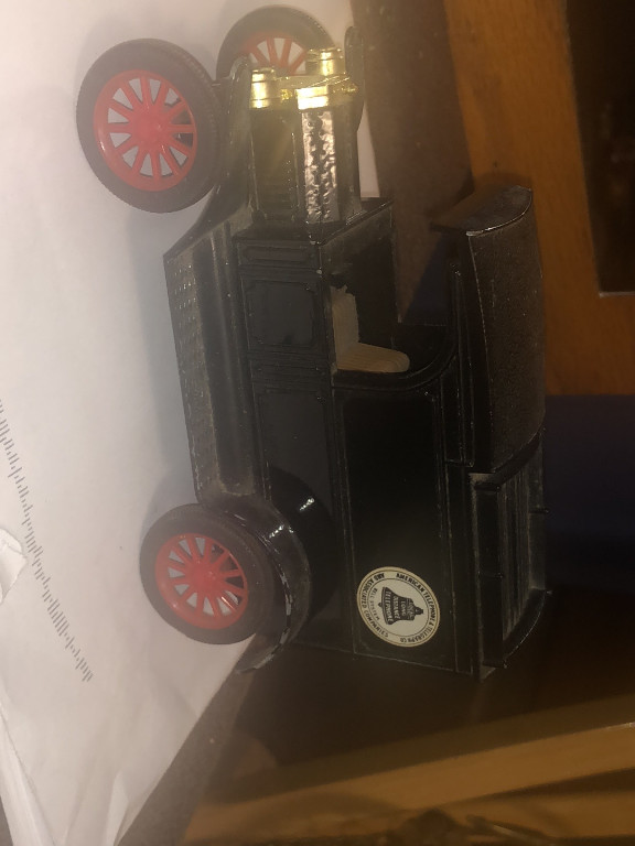 Die-cast metal replica of 1913 Ford Model T Van by Ertl