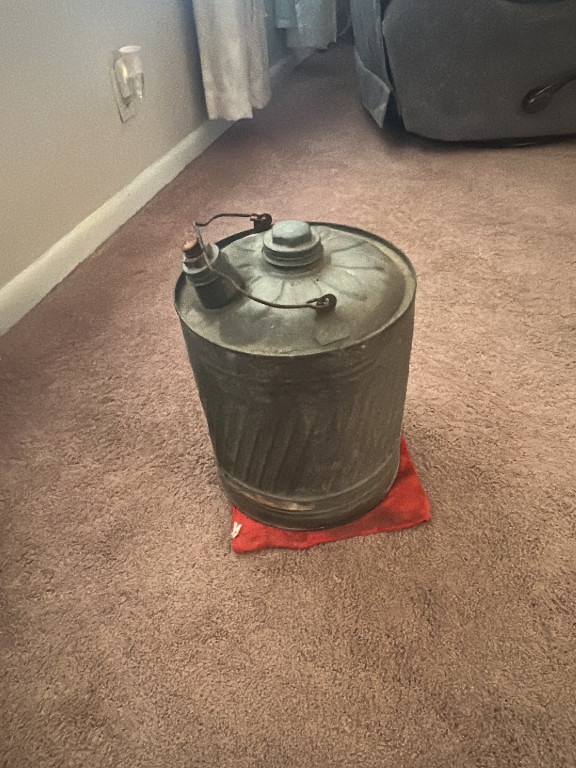 Vintage galvanized metal fuel can with Delphos-style cap
