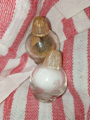 Vintage mustard seed pendant encased in clear acrylic or lucite