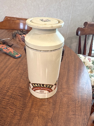 Ceramic milk churn-style canister with 'Baileys Original Irish Cream' branding