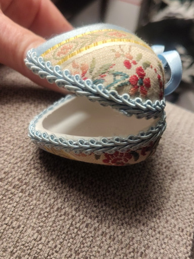 Porcelain trinket box in egg shape with floral decoration by Atelier Jean-Claude