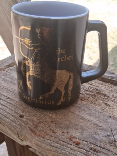 Milk glass mug with zodiac design titled 'Sagittarius The Archer' by Federal Glass Company