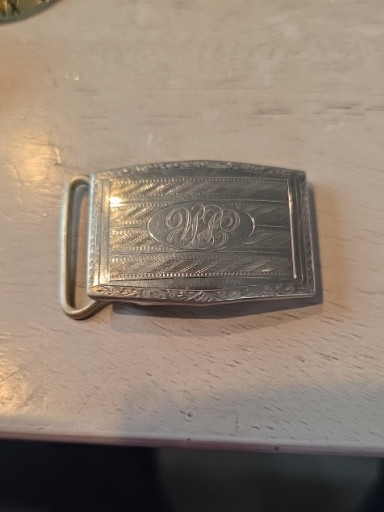 Sterling silver belt buckle with engraved monogram 'LG'