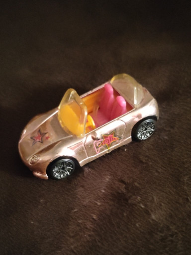 Plastic toy car from Mattel's 'Polly Pocket Race to the Mall' playset