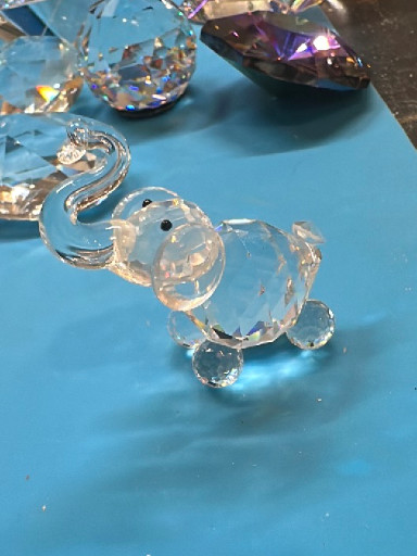 Crystal glass elephant figurine with trunk raised