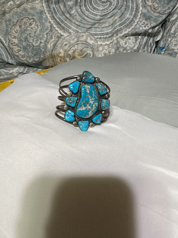 Sterling silver cuff bracelet with turquoise cluster design