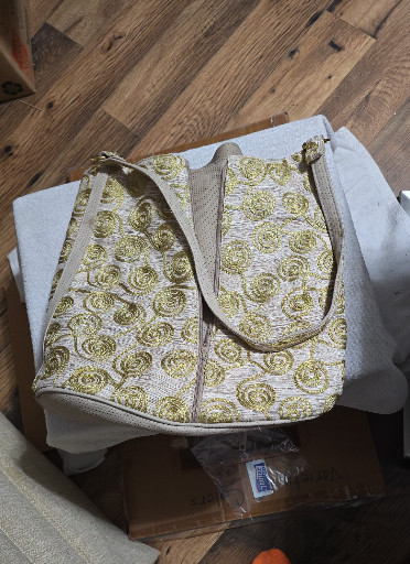 Embroidered tote bag with gold embroidered pattern on ivory background by Giane N