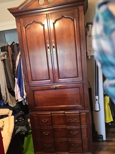 Cherry wood armoire/entertainment center by Thomasville