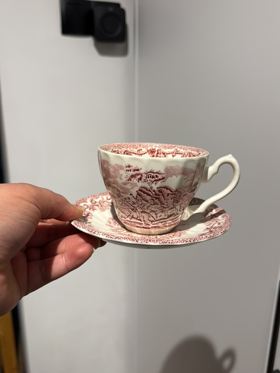 Ceramic teacup and saucer with red transferware hunting scene by Royal Wessex