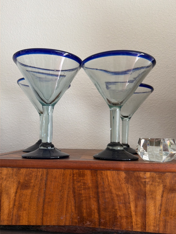 Hand-blown glass martini glasses with cobalt blue rim