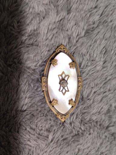 Mother-of-pearl brooch with gold-filled or gold-tone metal frame and seed pearl accents