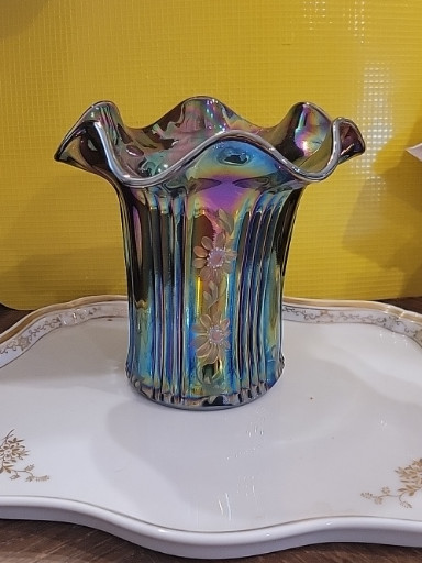 Carnival glass vase with ruffled rim and paneled body by Fenton Art Glass Company