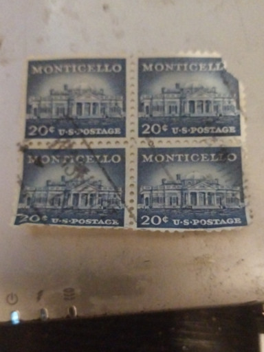 Block of four used U.S. postage stamps, 20¢ Monticello issue (Scott #1047)