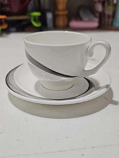 Bone china teacup and saucer in the 'Apollo' pattern by Wedgwood