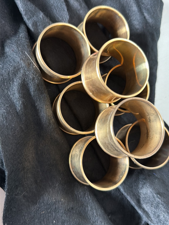 Set of brass napkin rings