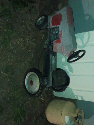 Vintage Massey Ferguson pedal tractor, likely Ertl brand