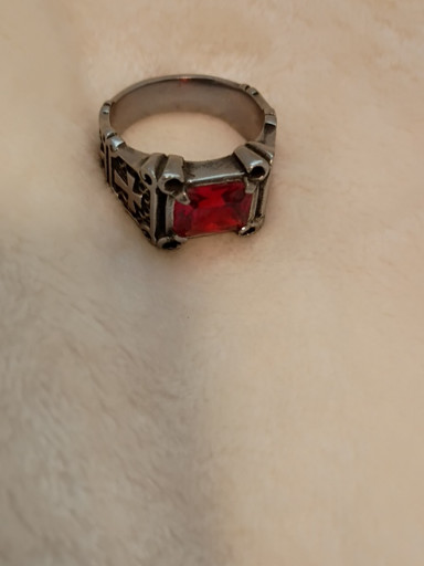 Stainless steel ring with red cubic zirconia stone and cross motif