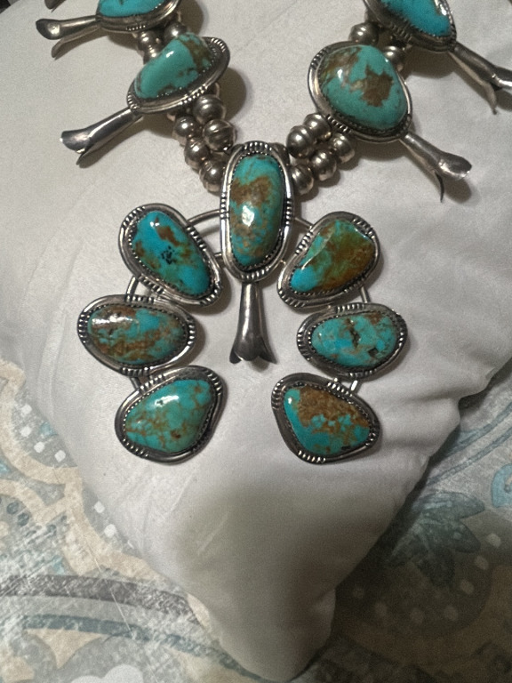 Sterling silver and turquoise Squash Blossom necklace with Naja pendant by Navajo artisan