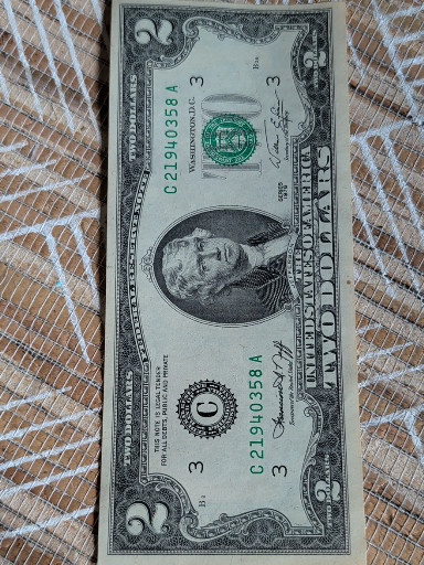 United States $2 Federal Reserve Note with serial number E00449276C