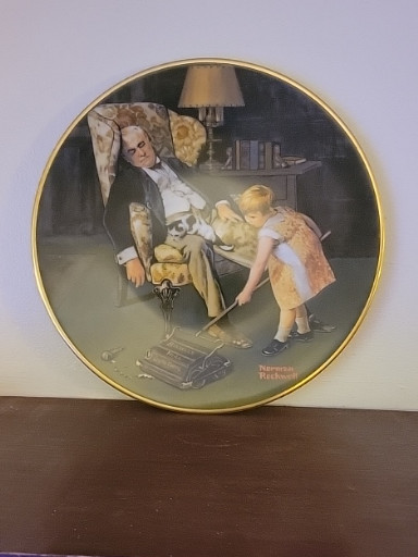 Porcelain collector plate titled 'Grandpa's Guardian' by Norman Rockwell