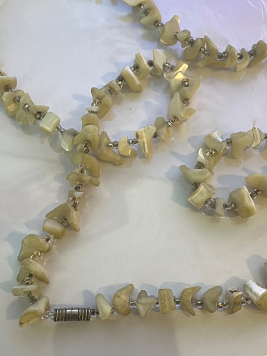 Mother-of-pearl chip necklace with metal spacer beads and barrel clasp