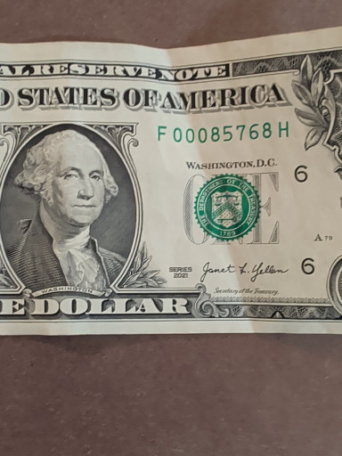 United States one dollar bill with fancy serial number F00085768H