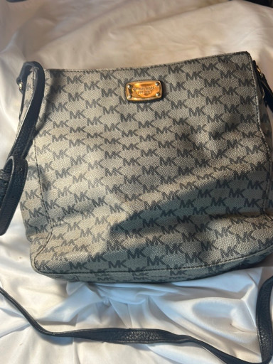 Michael Kors Jet Set Travel crossbody bag in signature MK monogram canvas with leather trim