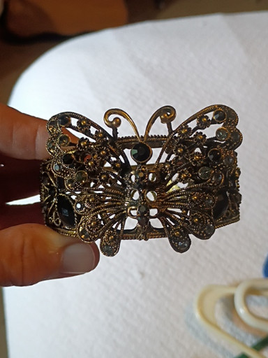 Brass filigree butterfly brooch with rhinestone and glass accents