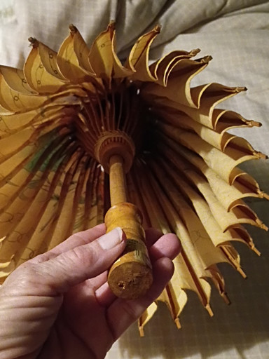 Bamboo and paper collapsible parasol or umbrella with yellow-gold oiled paper panels