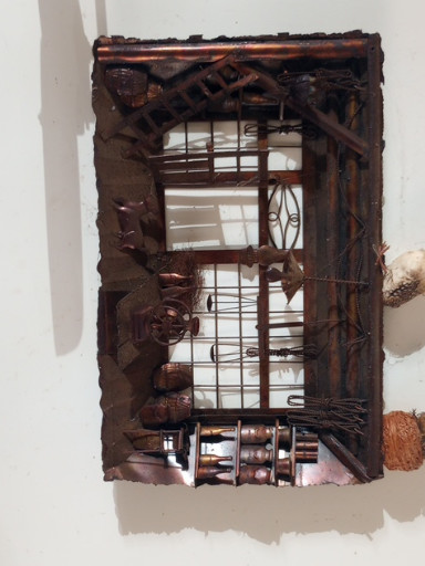 Metal wall hanging sculpture titled 'Rustic Barn Interior' by Enesco Imports