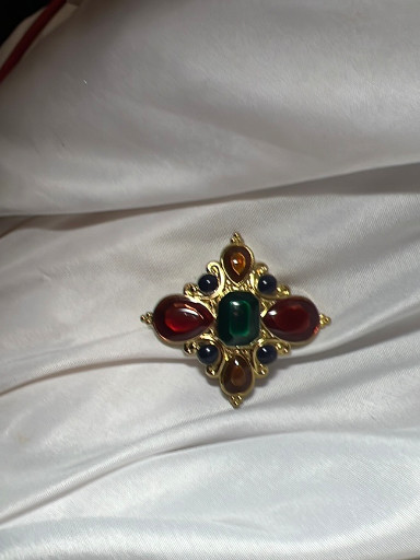 Gold-tone metal brooch or scarf slide with multicolor cabochon stones by Jay Strongwater