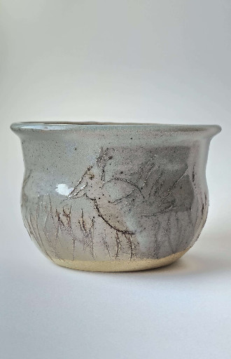 Ceramic tea bowl with nature-inspired leaf patterns from local pottery workshop