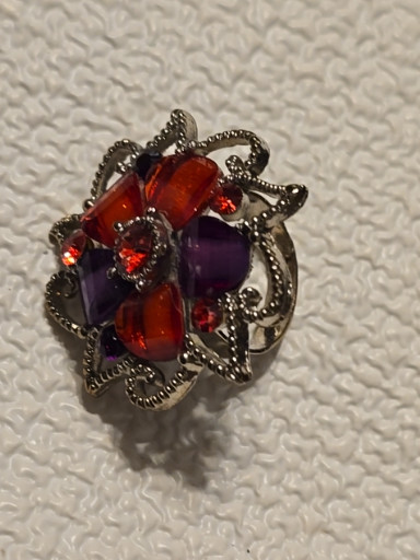 Sterling silver adjustable ring with red and purple gemstones and marcasite accents