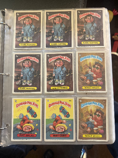 Collection of vintage Garbage Pail Kids trading cards from the 1980s, produced by Topps