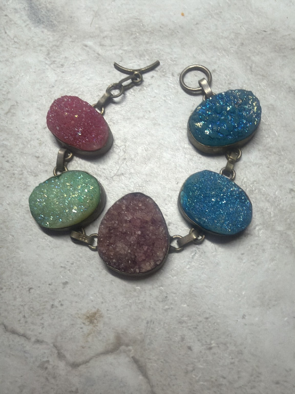 Druzy agate bracelet with titanium-coated gemstones in silver-tone metal settings