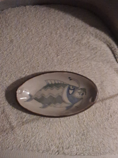 Studio pottery ceramic platter with hand-painted fish design