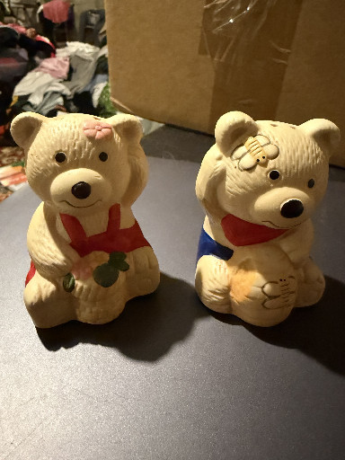 Ceramic salt and pepper shakers depicting honey bears in overalls