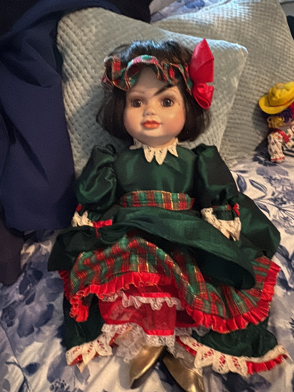 Porcelain doll titled 'Olive May' from the Christmas Collection by Marie Osmond
