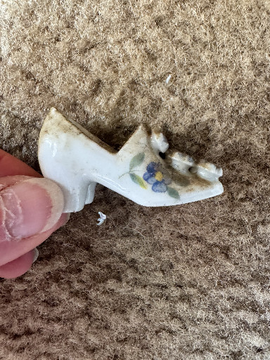Porcelain miniature shoe figurine with floral decoration, marked Japan