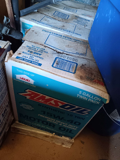 Four unopened cases of AMSOIL Premium Protection synthetic motor oil, each containing two 2.5-gallon containers